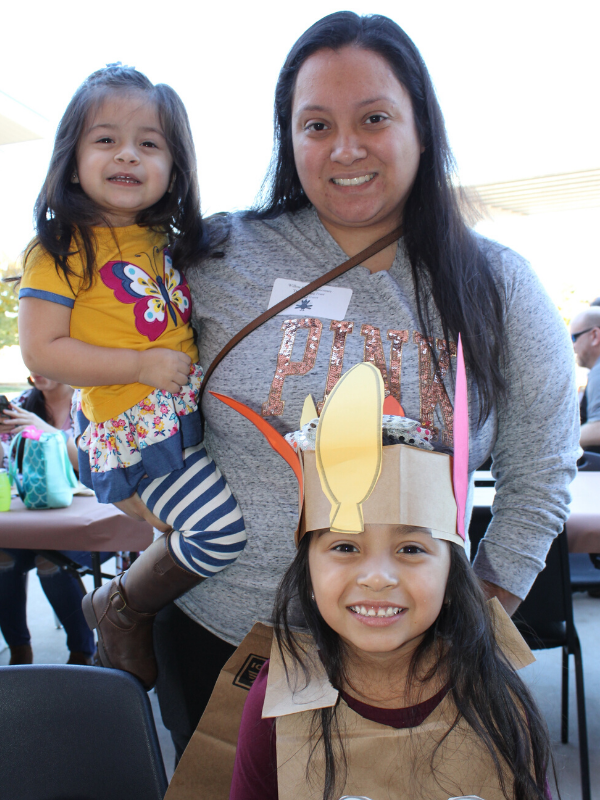 Mom and children smile